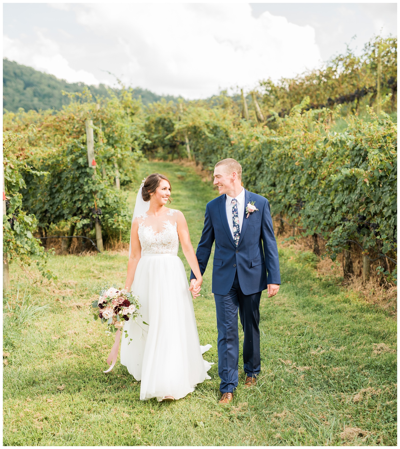 DelFosse vineyard wedding couple in the vines