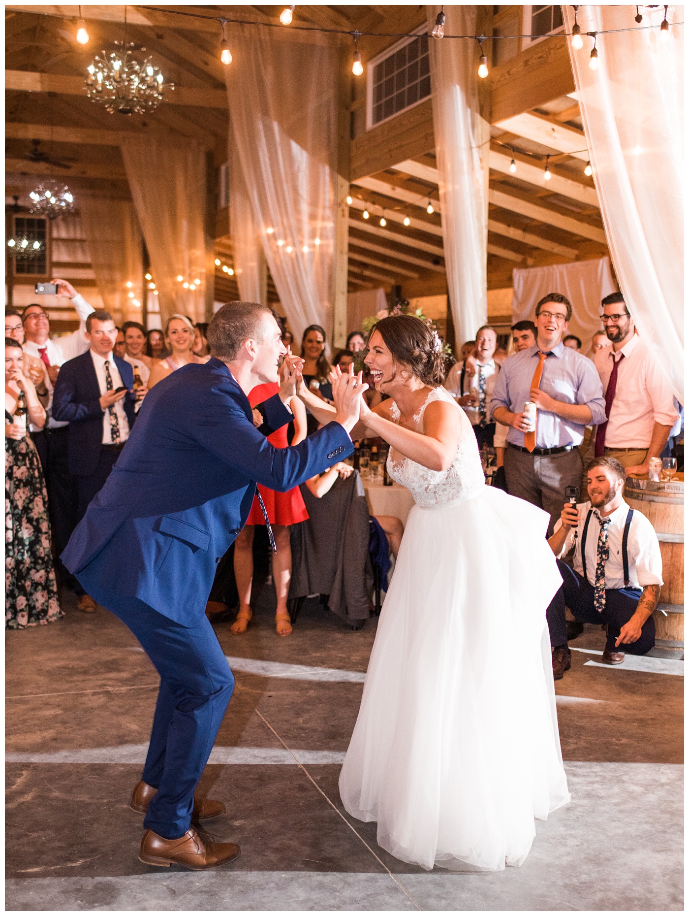 DelFosse Vineyard couple eating dancing during their reception
