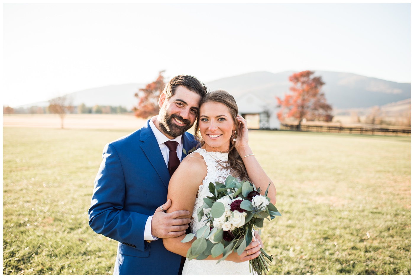 Bride and groom cuddle for their winter wedding in Charlottesville VA