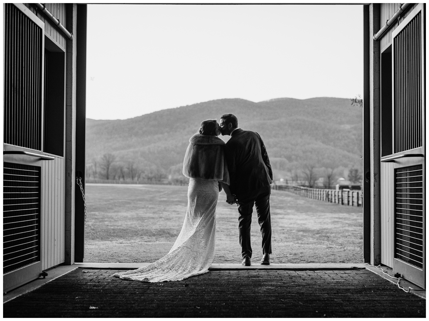Bride and groom cuddle for their winter wedding in Charlottesville VA