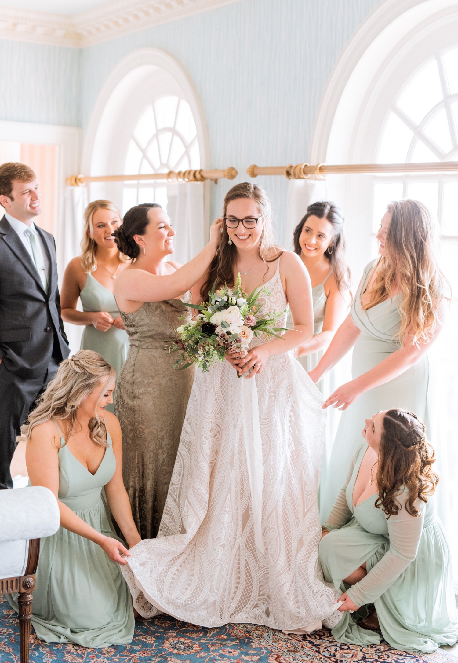 Bride leaves her bridal party in awe of her beauty as she gets ready at the Estate at River Run