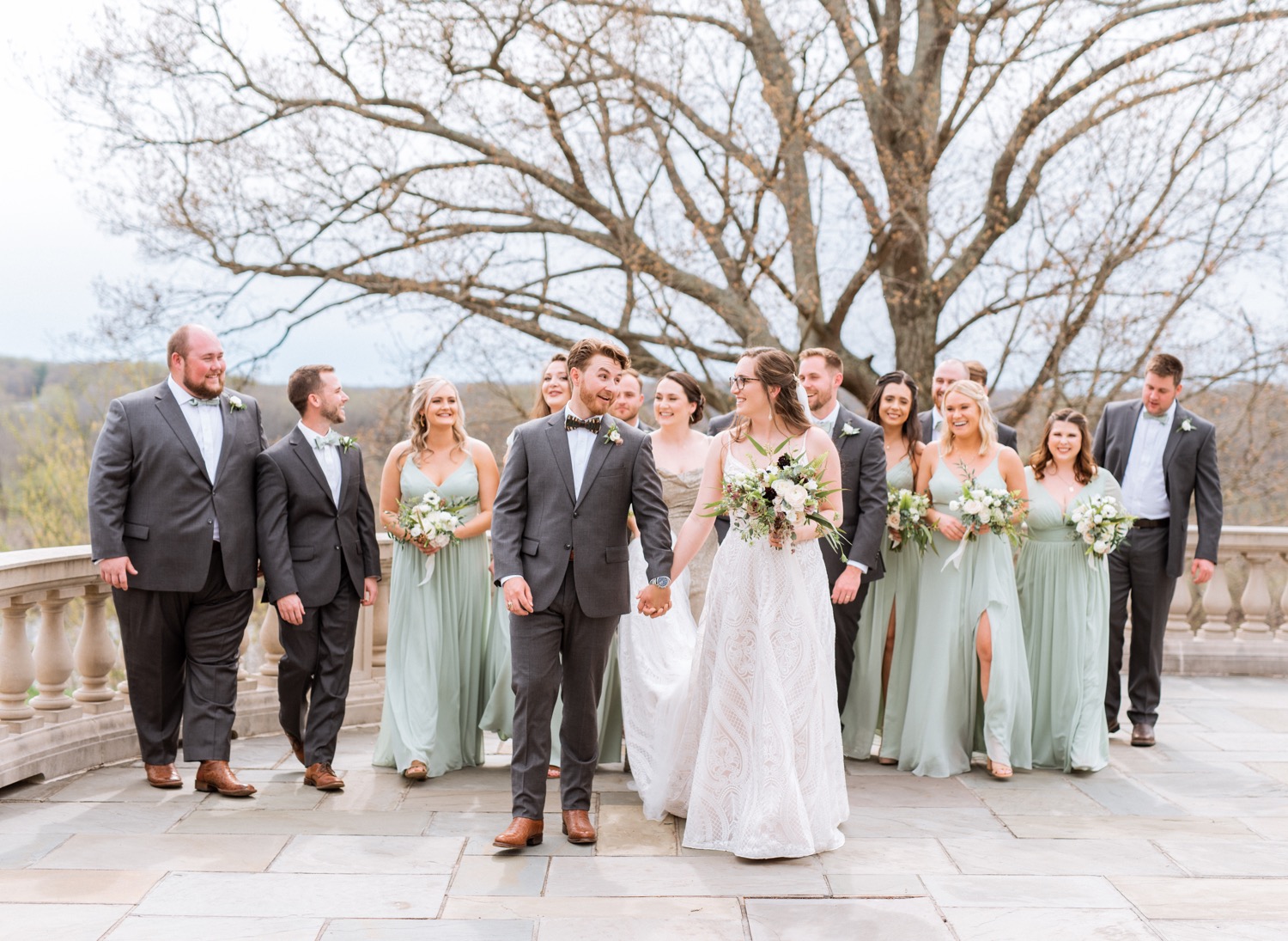 Bride and groom showcase their happiness with bridal party at wedding in Richmond Virginia