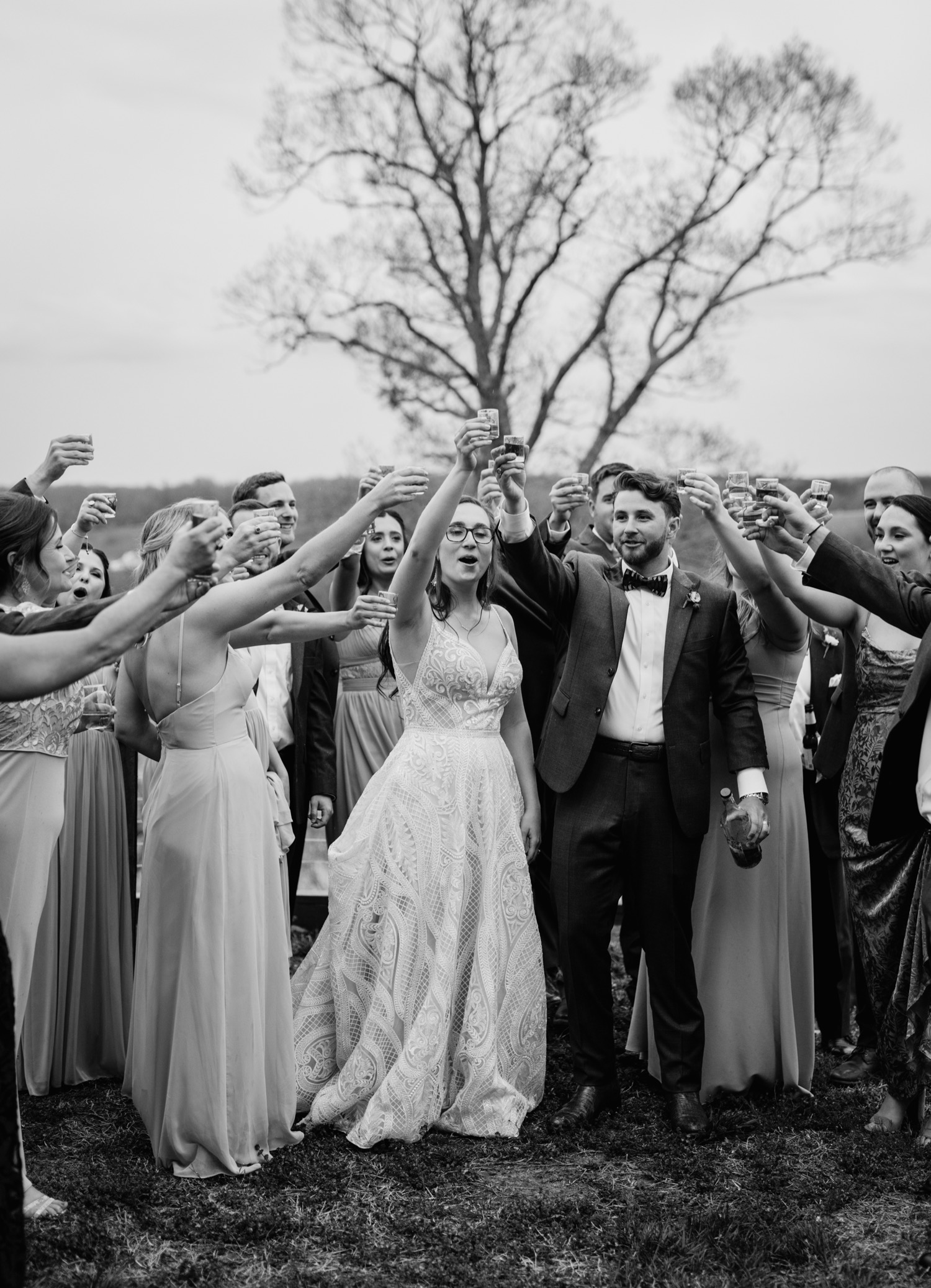 Bride and groom toast to their love with bridal party in Richmond Virginia