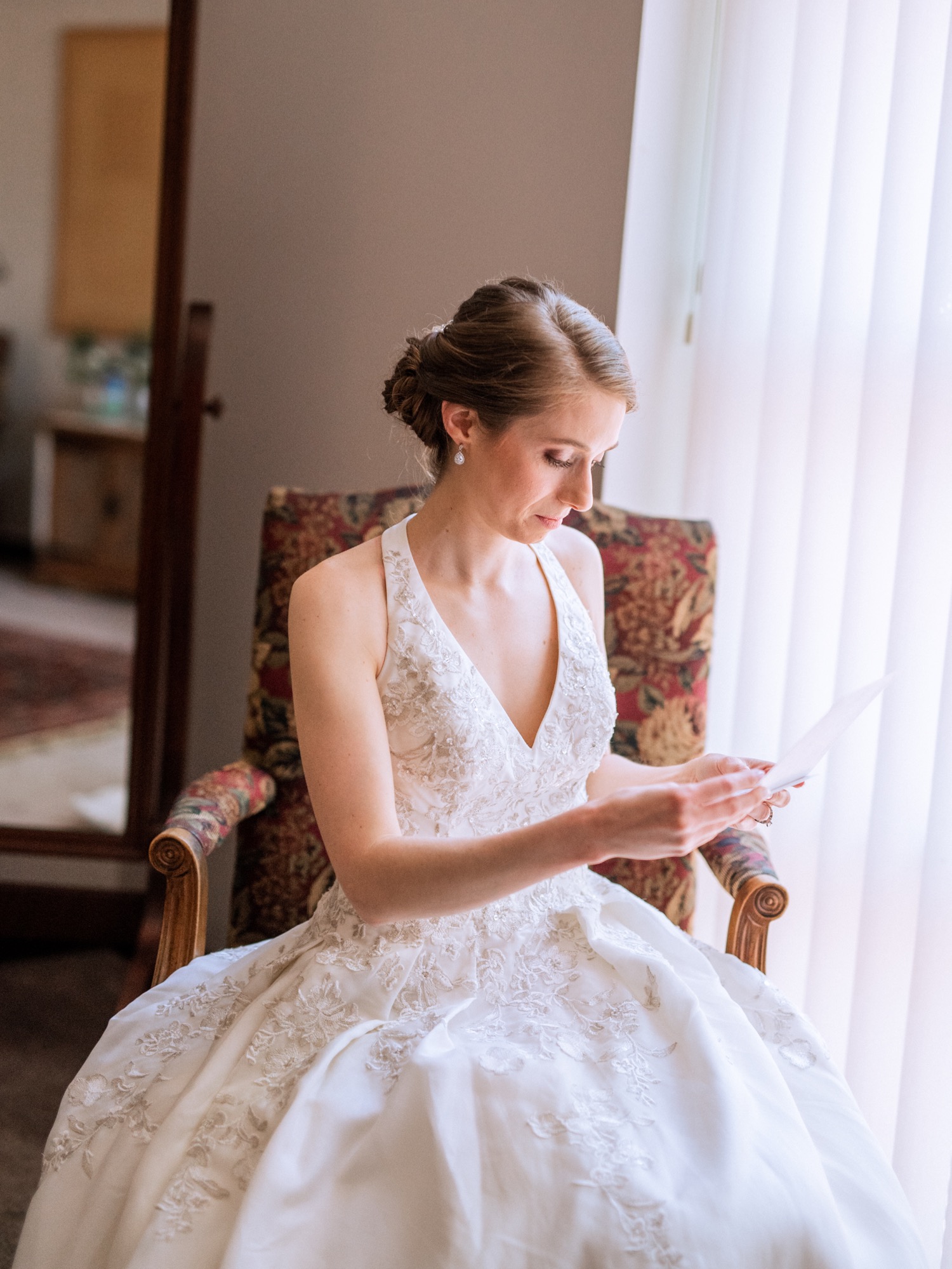 bride reading letter written by future husband