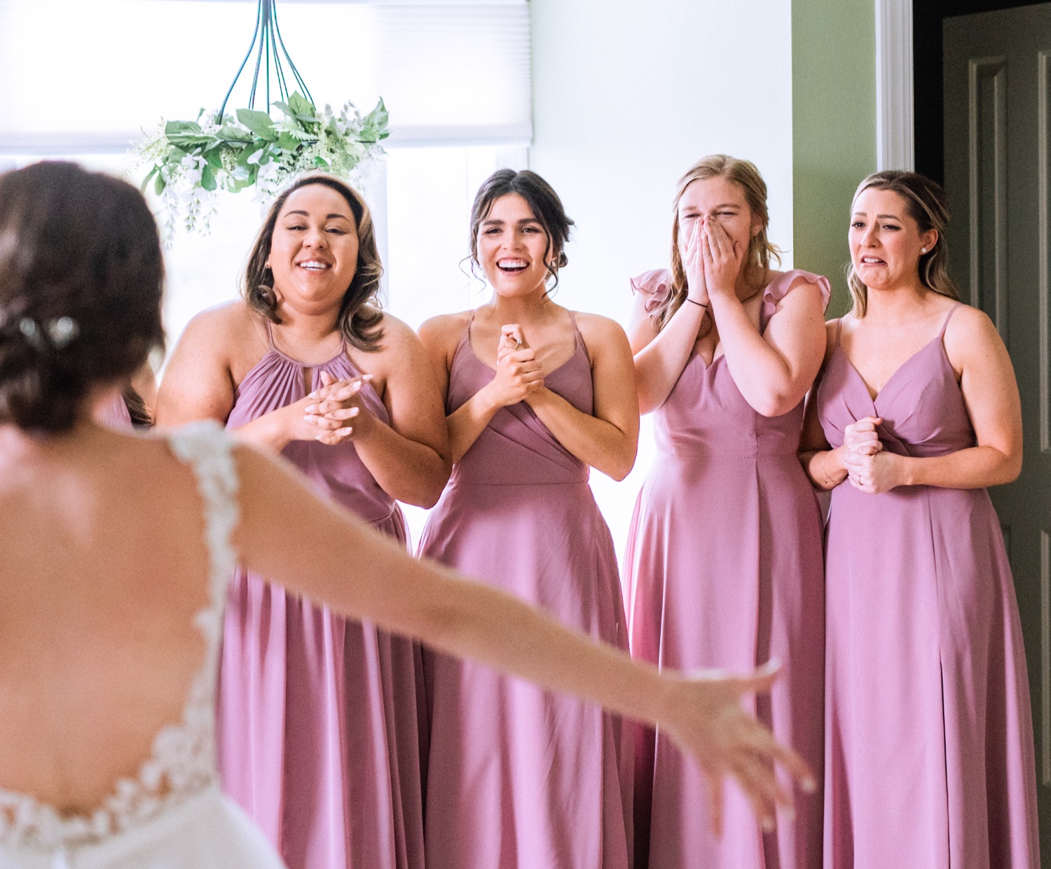 First look with bride and bridesmaids at Irvine Estate