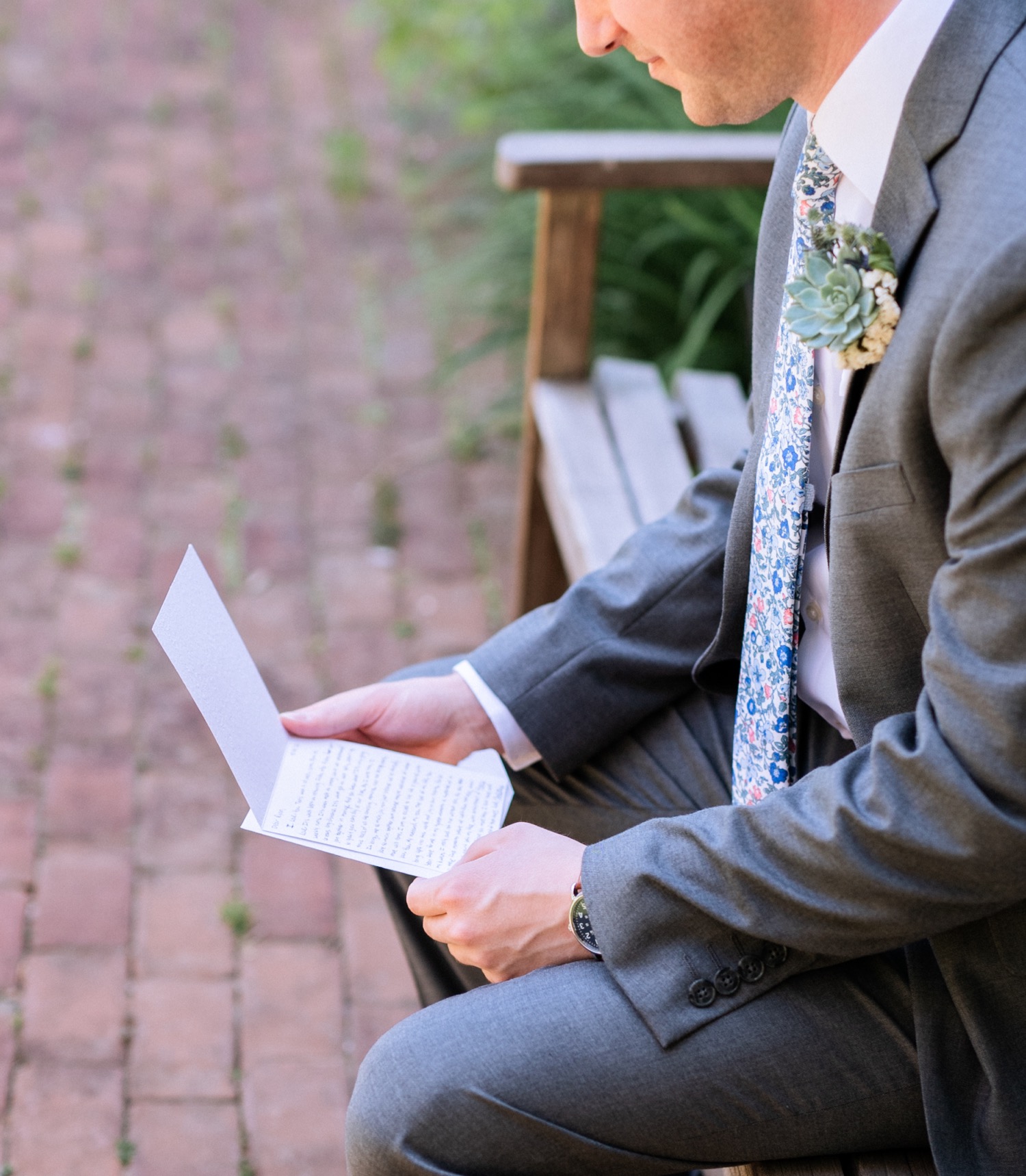 groom reading letter written by future wife