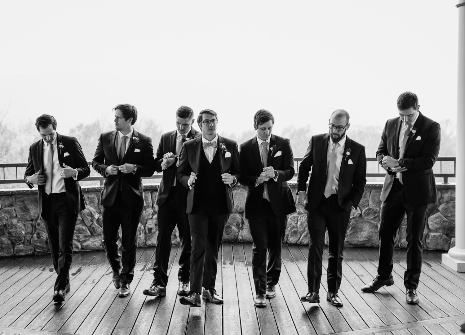 Groom and groomsmen posing before the wedding at Irvine Estate