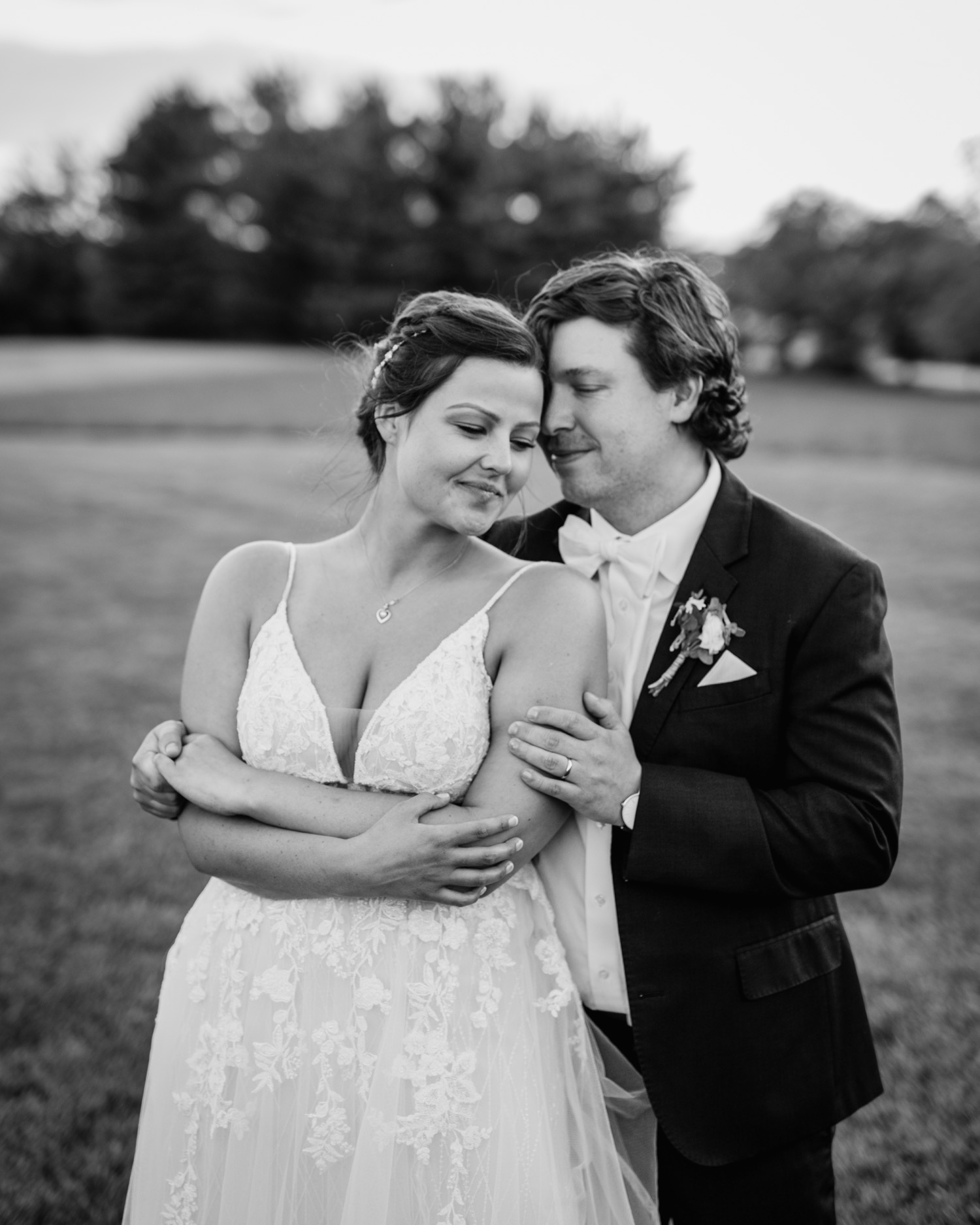 bride and groom hold each other close at Glen Ellen Farm wedding
