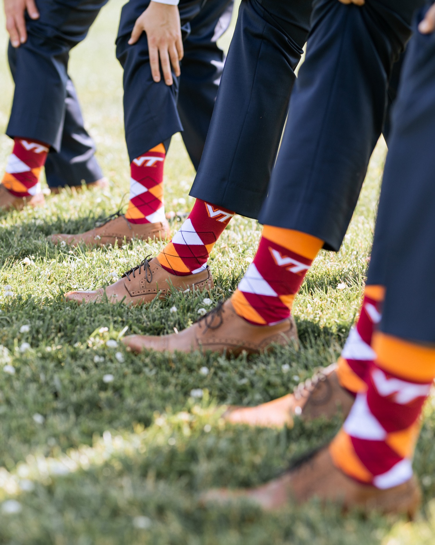 Groom and groomsmen reveal Virginia Tech Socks before wedding in Charlottesville, VA
