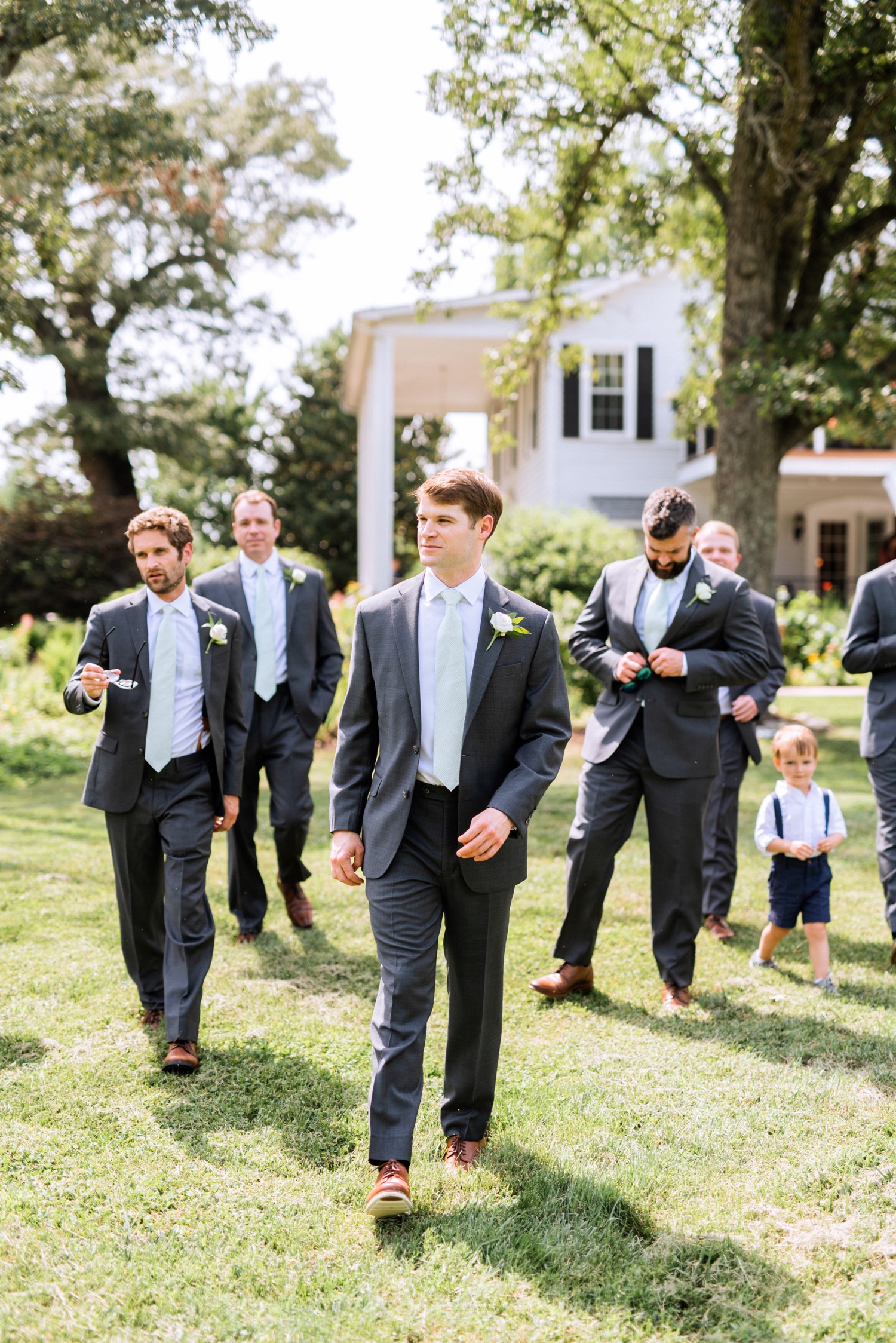 Groom and groomsmen dressed and ready for the wedding ceremony in Richmond, Virginia summer wedding