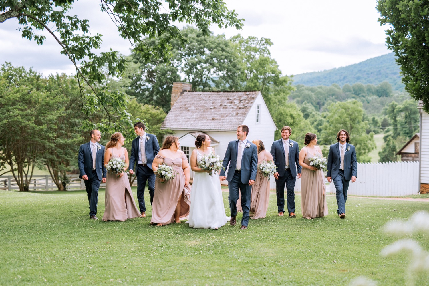 Bride, groom, and wedding party before their ceremony at James Monroe's Highland in Charlottesville, VA