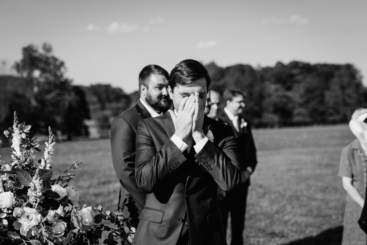 Groom crying as bride walks down the aisle at Charlottesville, VA wedding