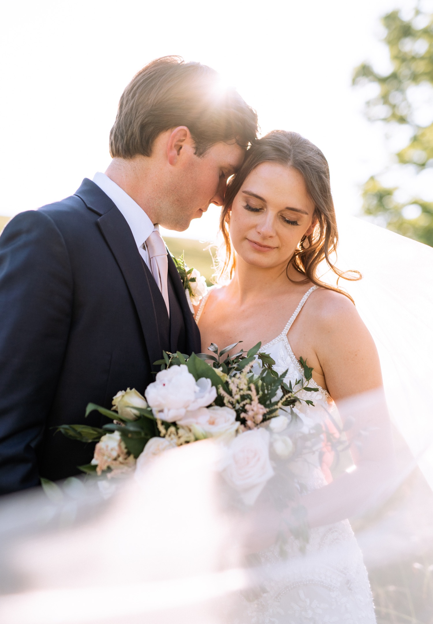 Wedding portraits with bride and groom after their wedding ceremony in Charlottesville, VA