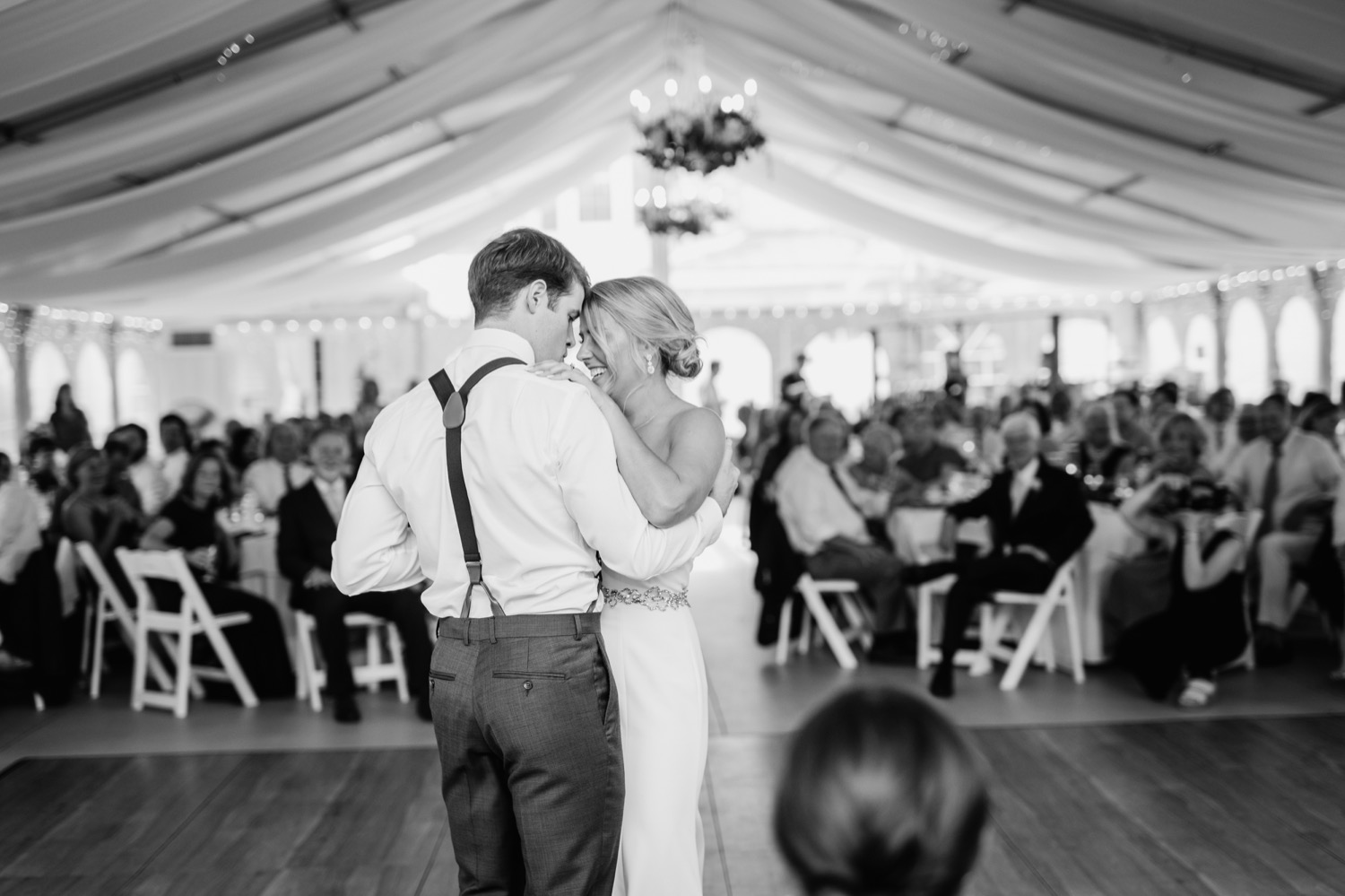Bride and groom sharing their first dance during wedding reception at Amber Grove in Richmond, Virginia
