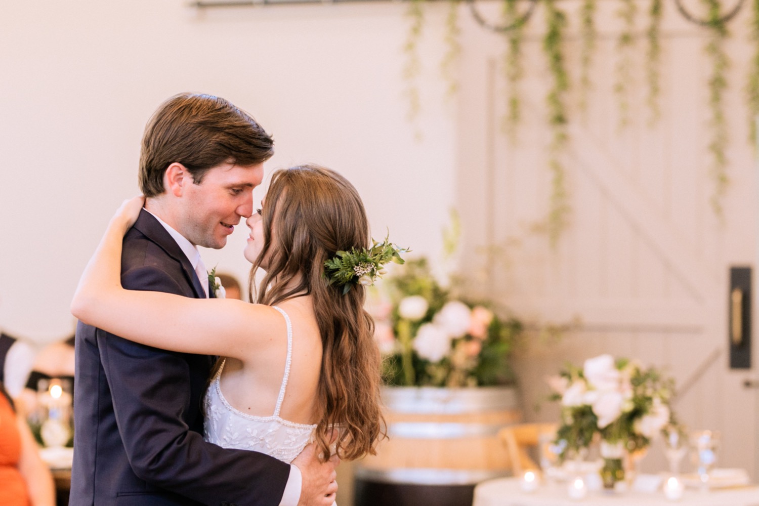 Bride and groom share first dance during their wedding reception in Charlottesville, VA