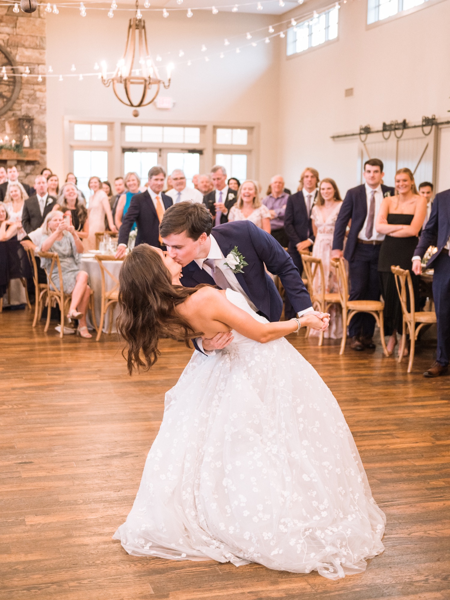 bride and groom sharing their first dance during their wedding reception at the King Family Vineyard