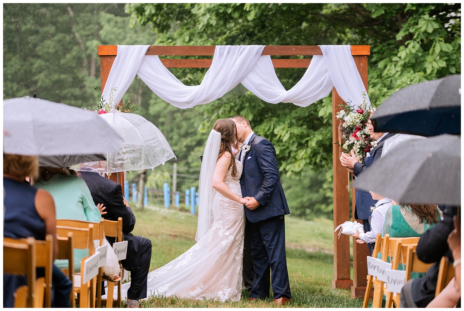 Bride and Groom first kiss at Ashton Creek Vineyard wedding