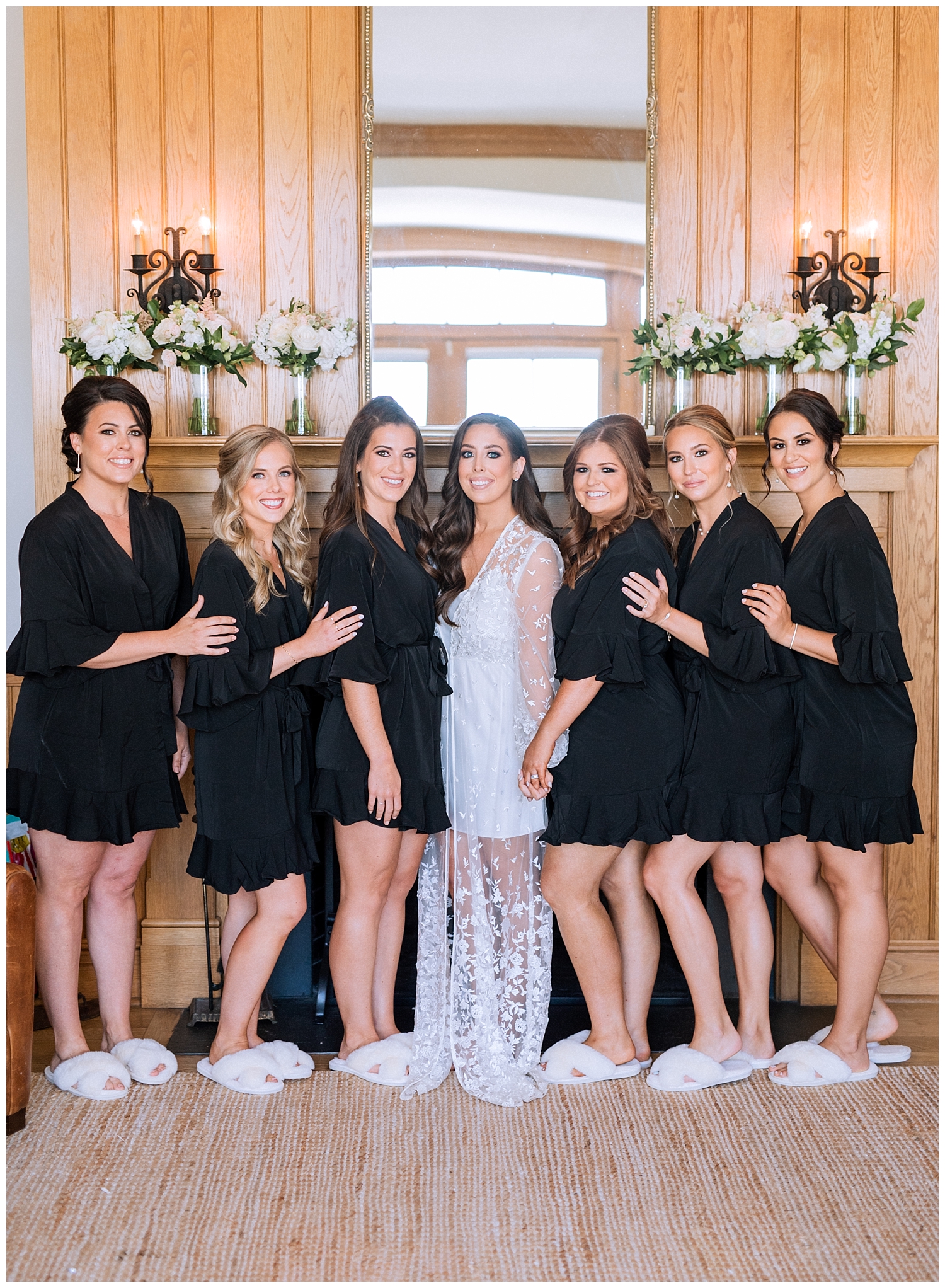 Bride and bridesmaids getting ready in black and white robes