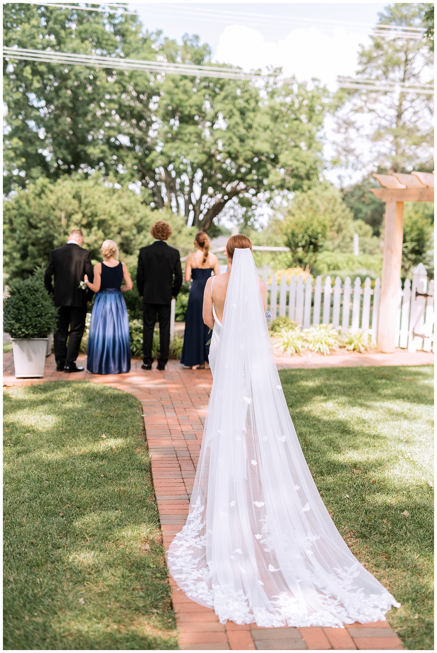 Bride first look with family at Fleetwood Farm Winery wedding in Leesburg, Virginia