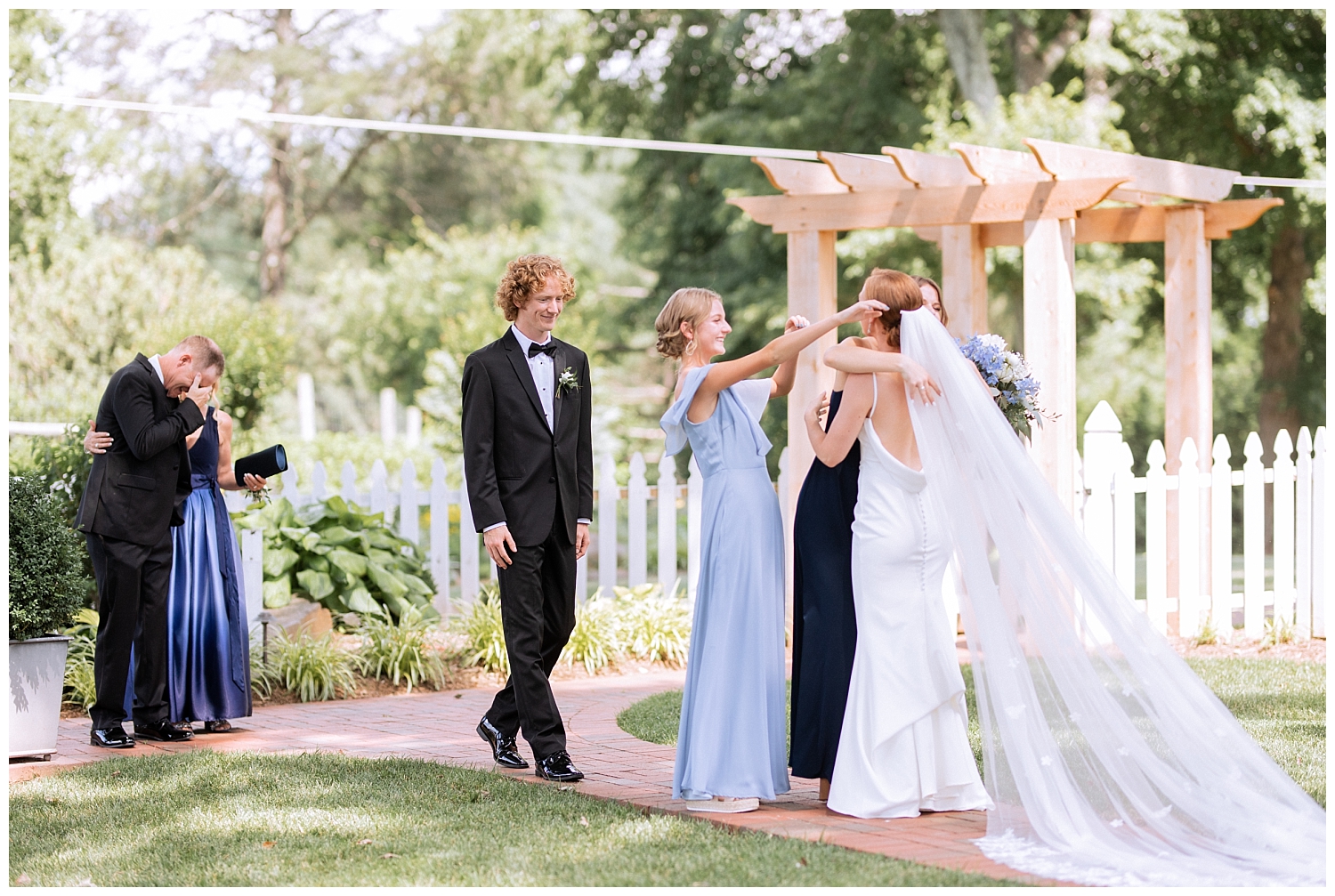 Bride first look with family at Fleetwood Farm Winery wedding in Leesburg, Virginia