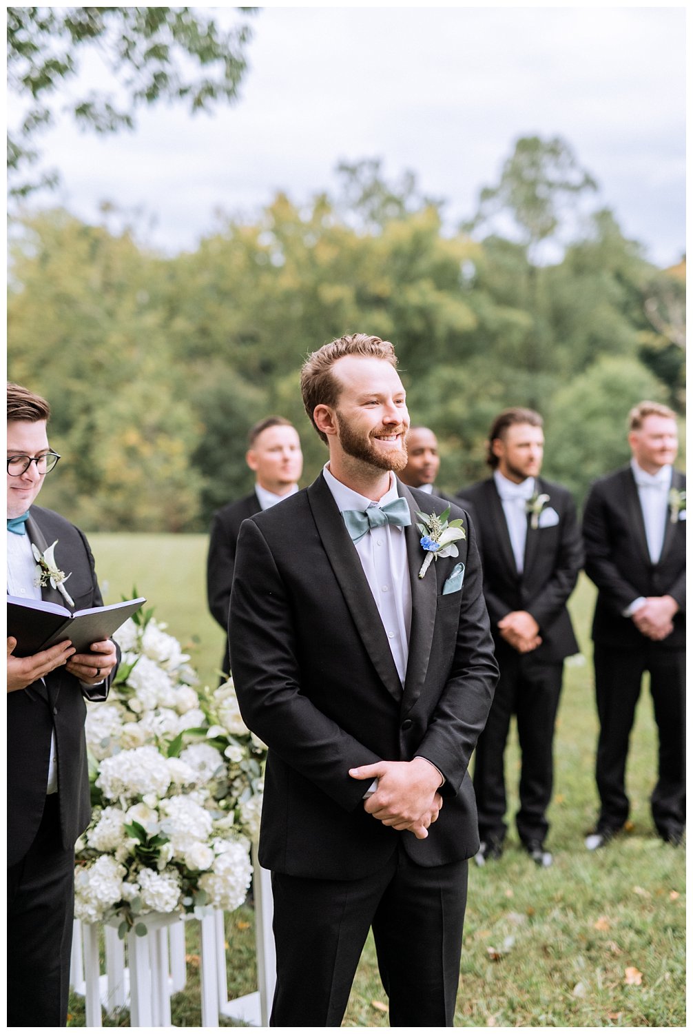 Groom at ceremony at Westover & Maymont Gardens wedding