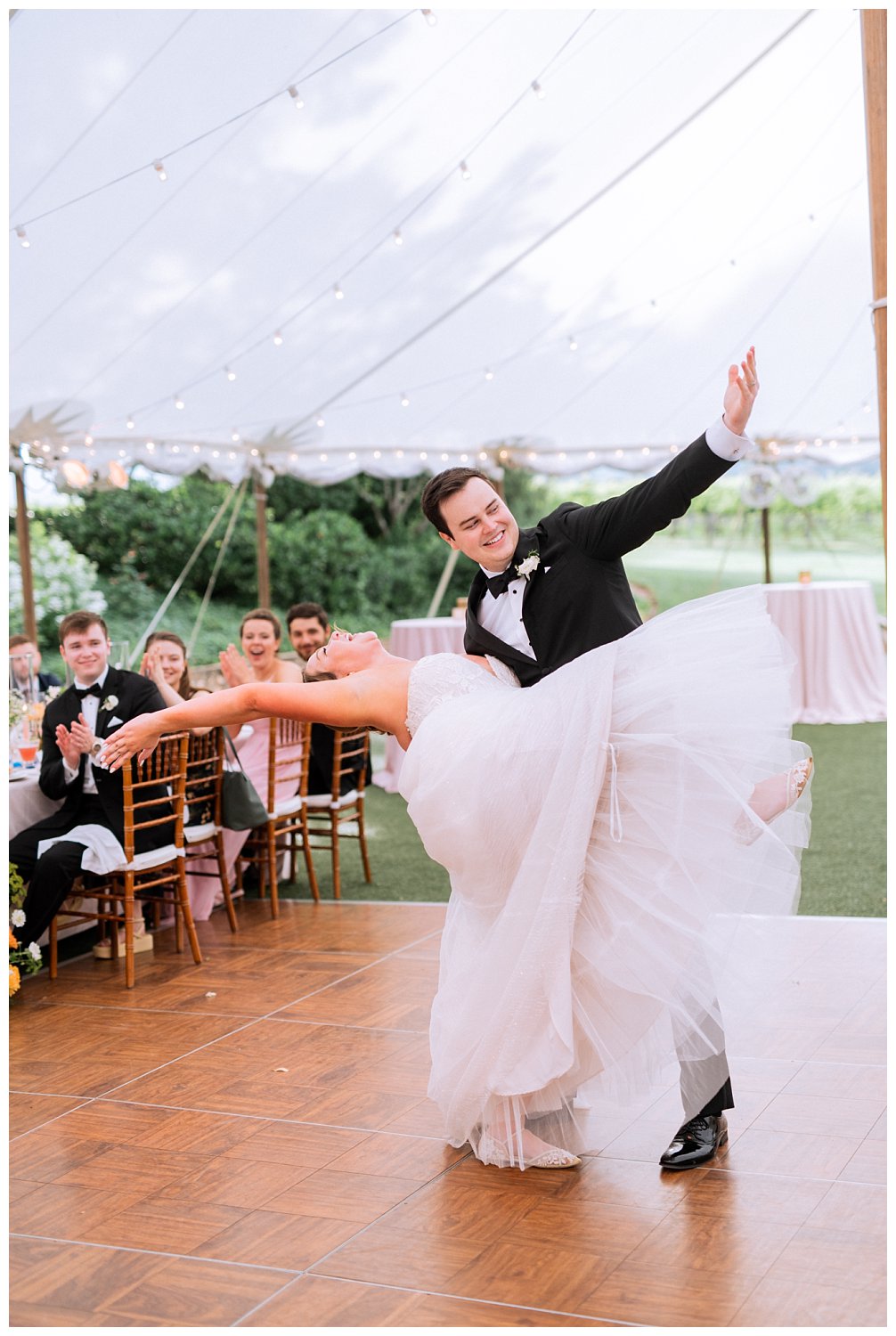Bride and groom first dance at their colorful summer wedding in Charlottesville, Virginia