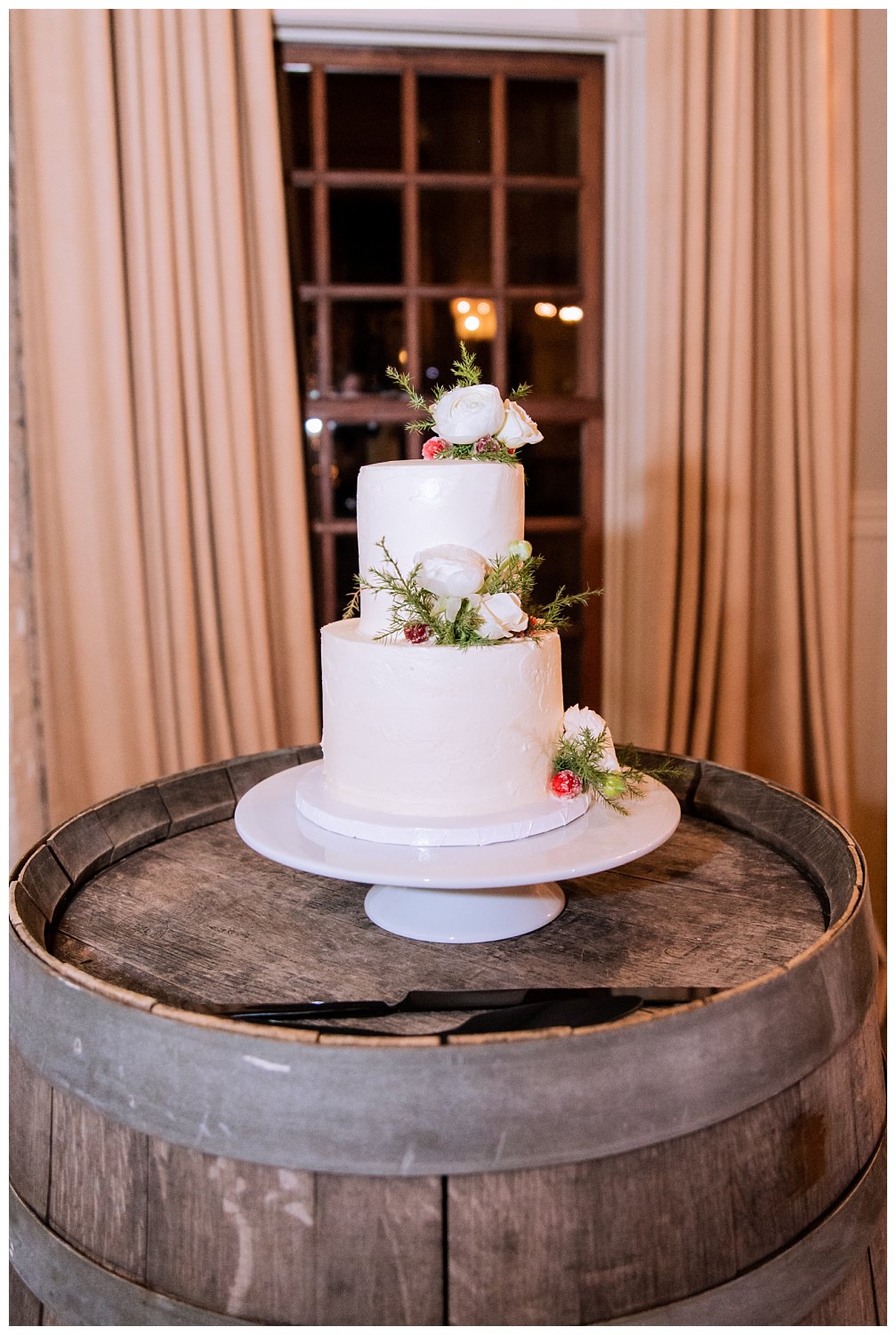 Winter inspired two tier white wedding cake at Early Mountain Vineyard wedding in Charlottesville, Virginia