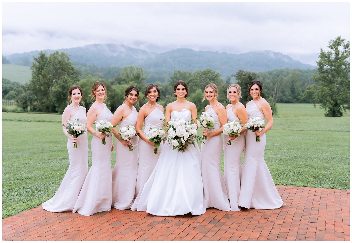 Bride with bridesmaids in champagne dresses