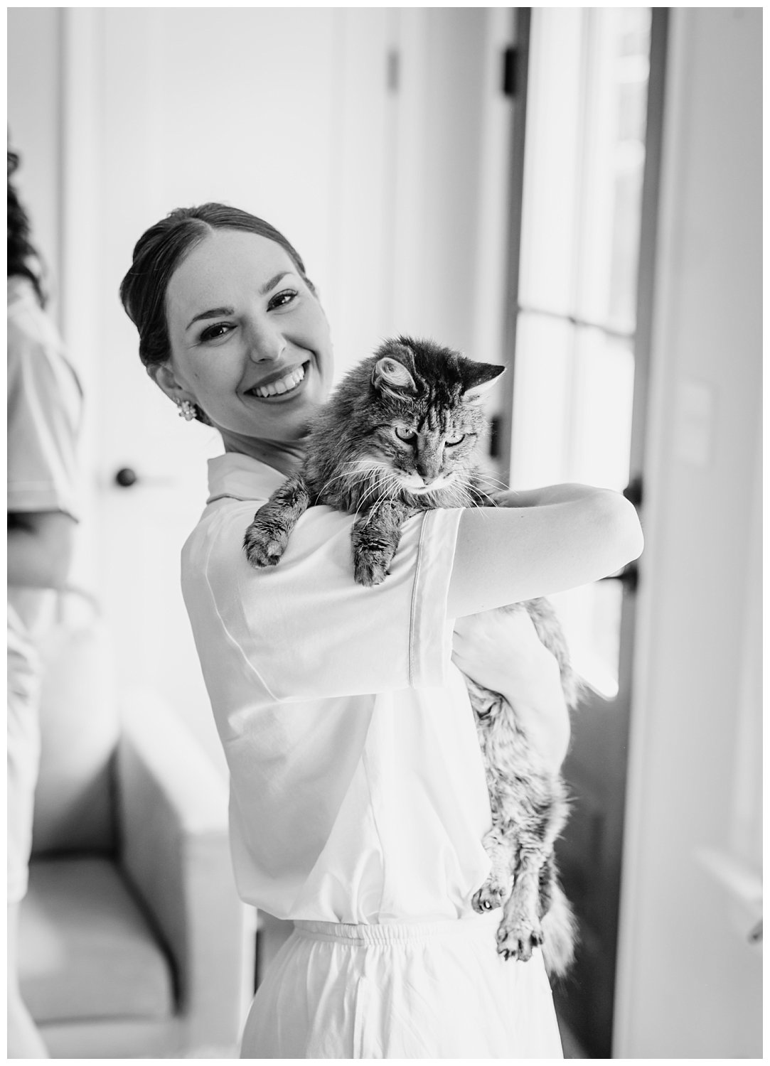 Bride and her cat on her wedding day at King Family Vineyard