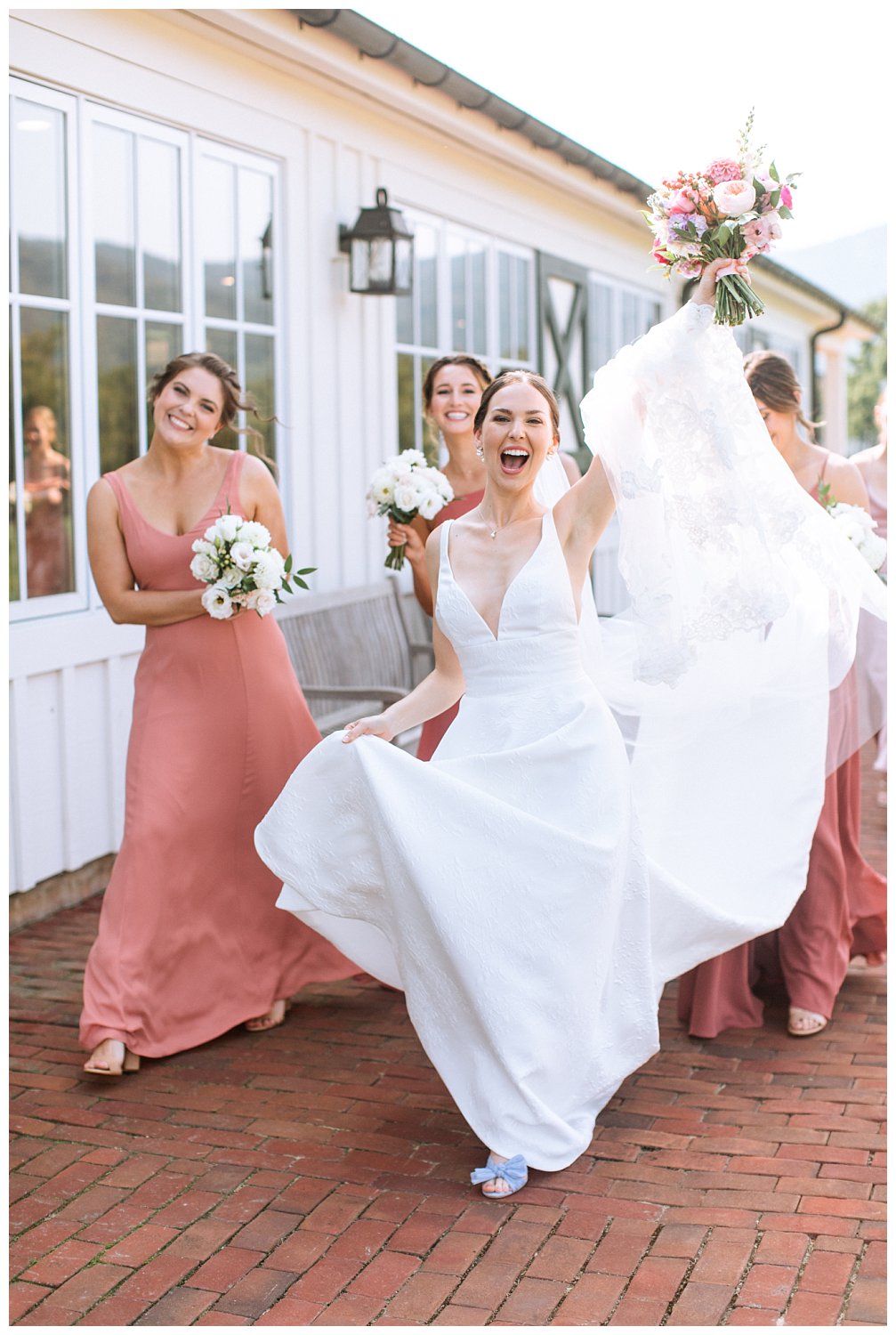 Portraits of the bride with her bridesmaids at her King Family Vineyard wedding