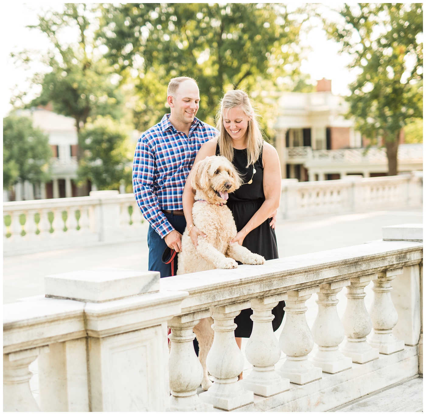 UVA engagement couples photos with their dog in Charlottesville Virginia