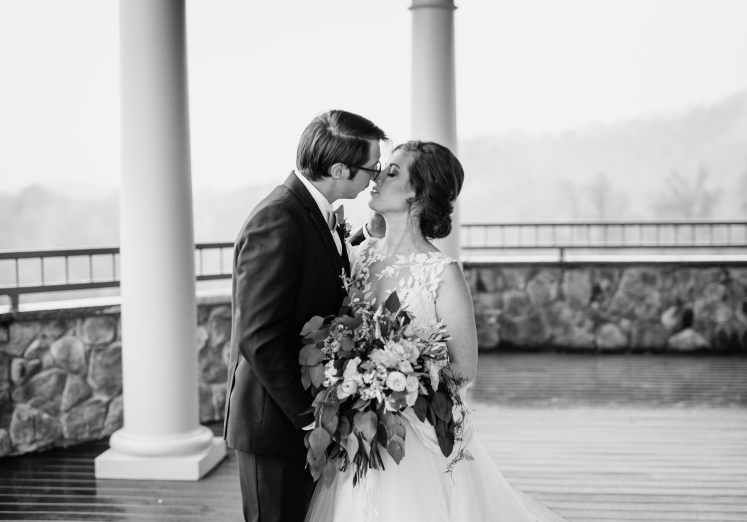 Bride and groom kiss at wedding in Lexington Virginia