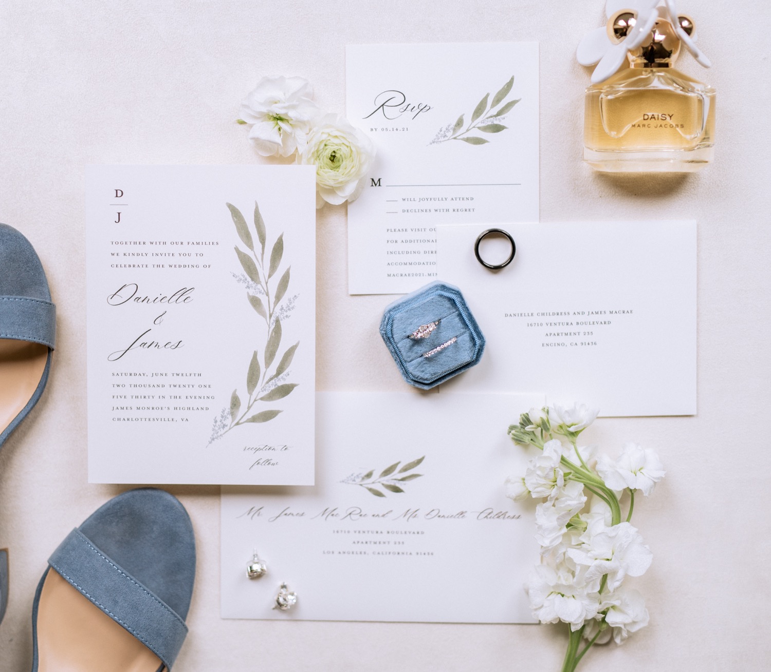 Wedding flowers, shoes, rings, and invitation