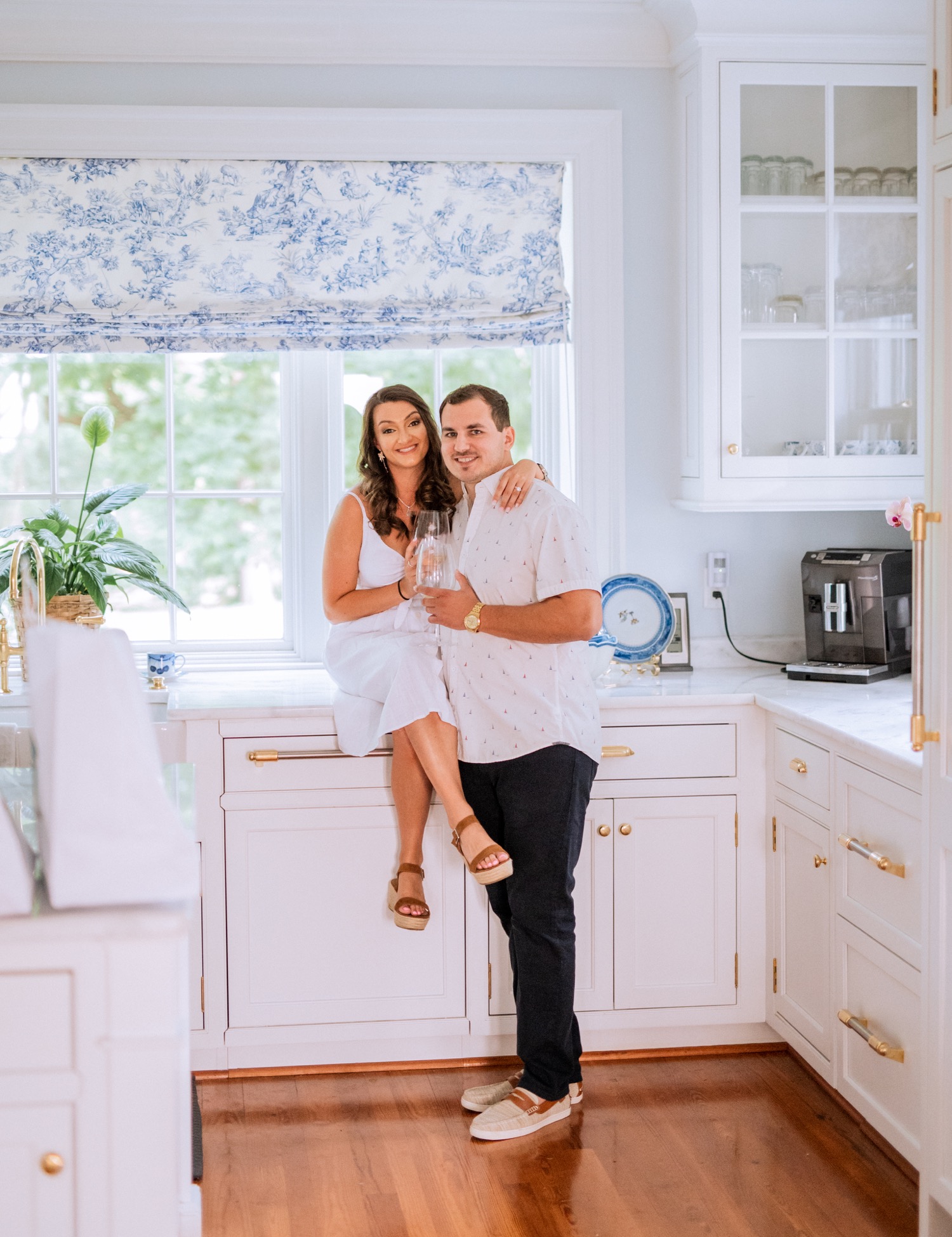 engaged couple hold each other close in kitchen at Cumberland Estate in Richmond virginia