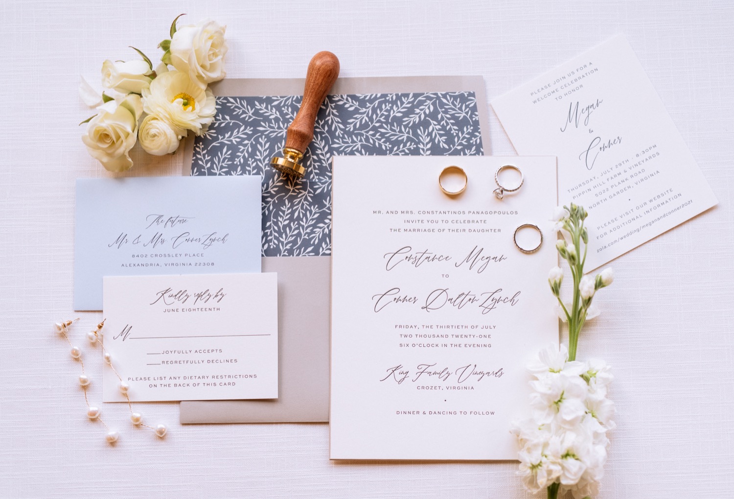 invitation, rings, save the date, and flowers